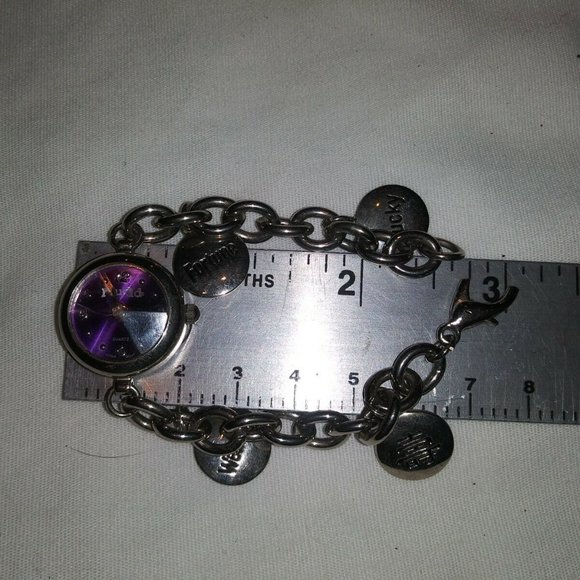 LADIES MUDD CHARM BRACELET ROUND FACE WRISTWATCH CA 00608 main image 9